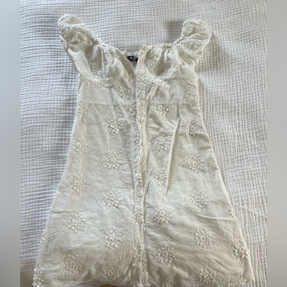 White mini dress with detailing